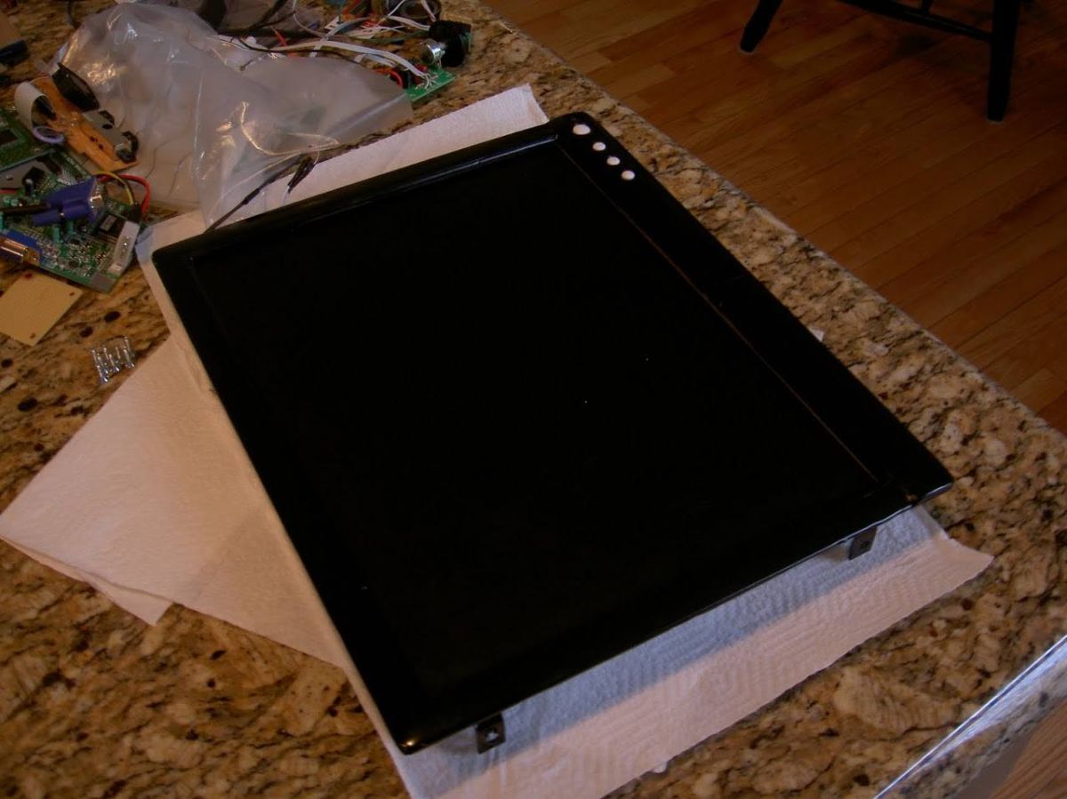 The screen sitting in its case